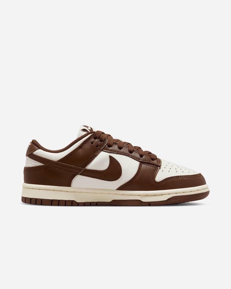 Nike blanche top semelle marron