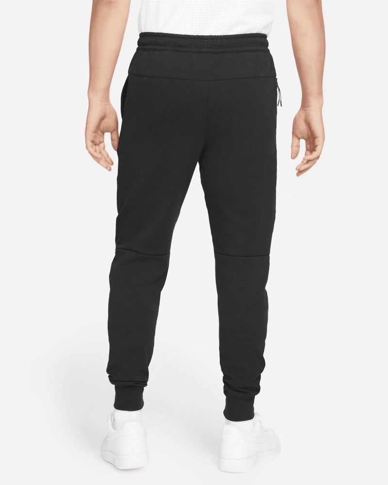 Joggers grises de corte slim essentials de best sale nike