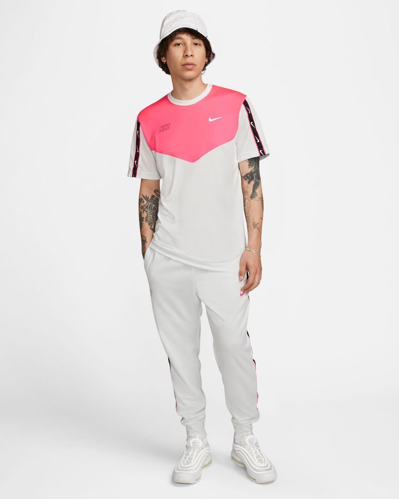 Pink nike jumpsuit mens sales