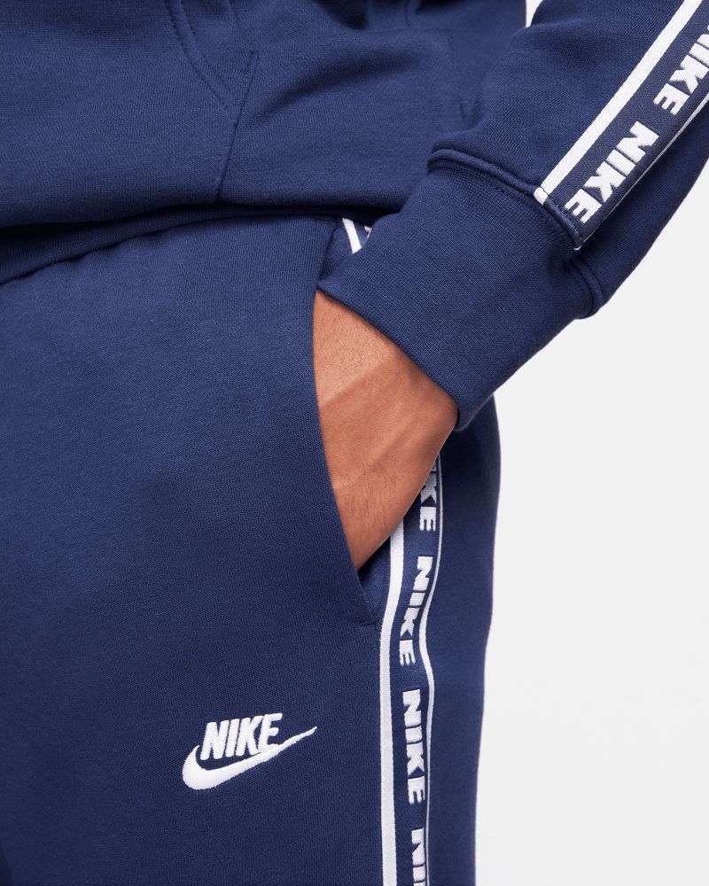 Nike repeat tape sale poly full zip tracksuit