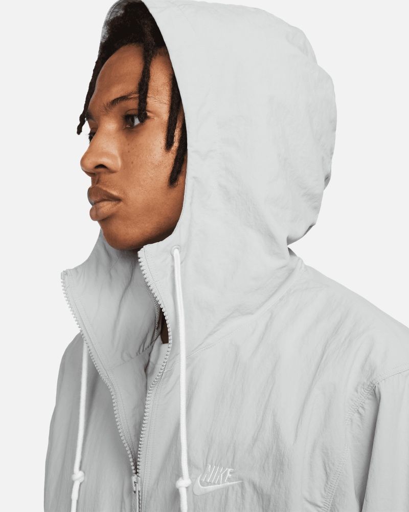 white nike sportswear jacket