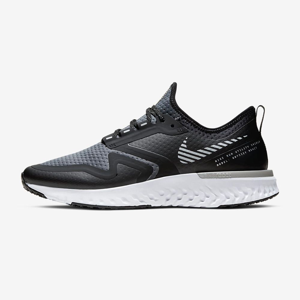 Nike odyssey top react shield mujer