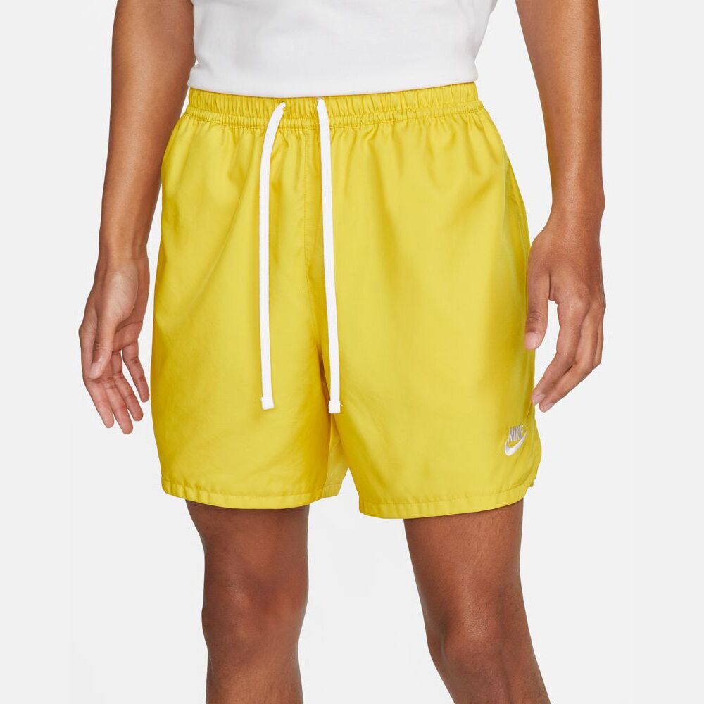 Nike shorts men yellow online