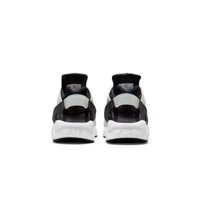 Scarpe nike huarache nere e bianche new arrivals