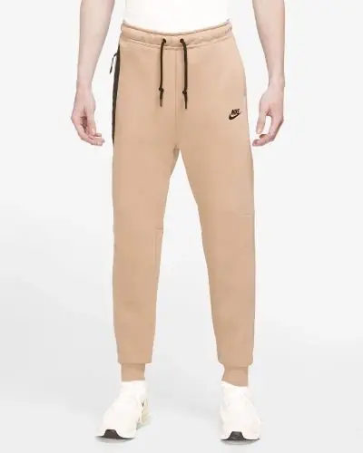 Cream nike joggers online