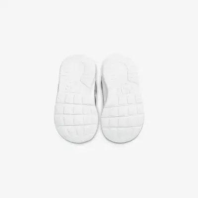 chaussures nike tanjun enfant bleu 818383 011