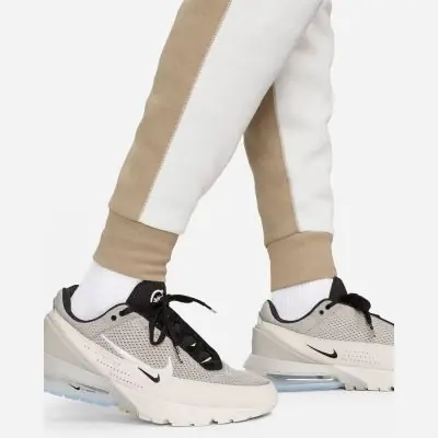 bas jogging nike tech fleece slim fit beige homme fb8002 121